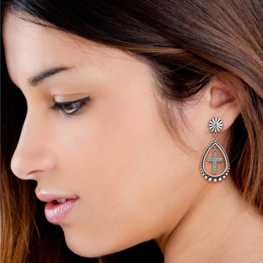 Aretes Colgantes en Cruz con Piedra Turquesa Hipoalergénicos Jessica Simpson Tono Plata