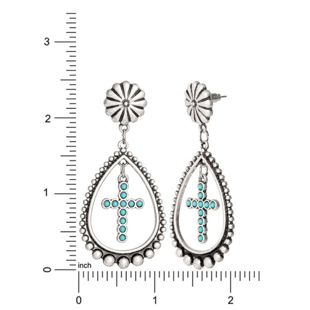Aretes Colgantes en Cruz con Piedra Turquesa Hipoalergénicos Jessica Simpson Tono Plata
